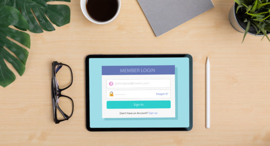 Member login screen on a tablet sitting on a desk