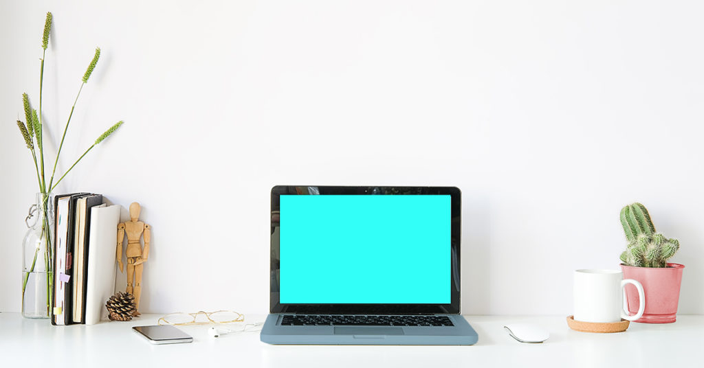 Laptop computer sitting on a desk