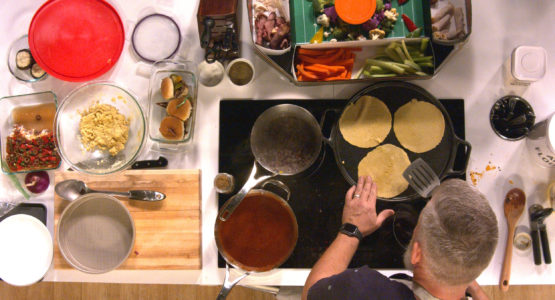 A cook preparing a meal